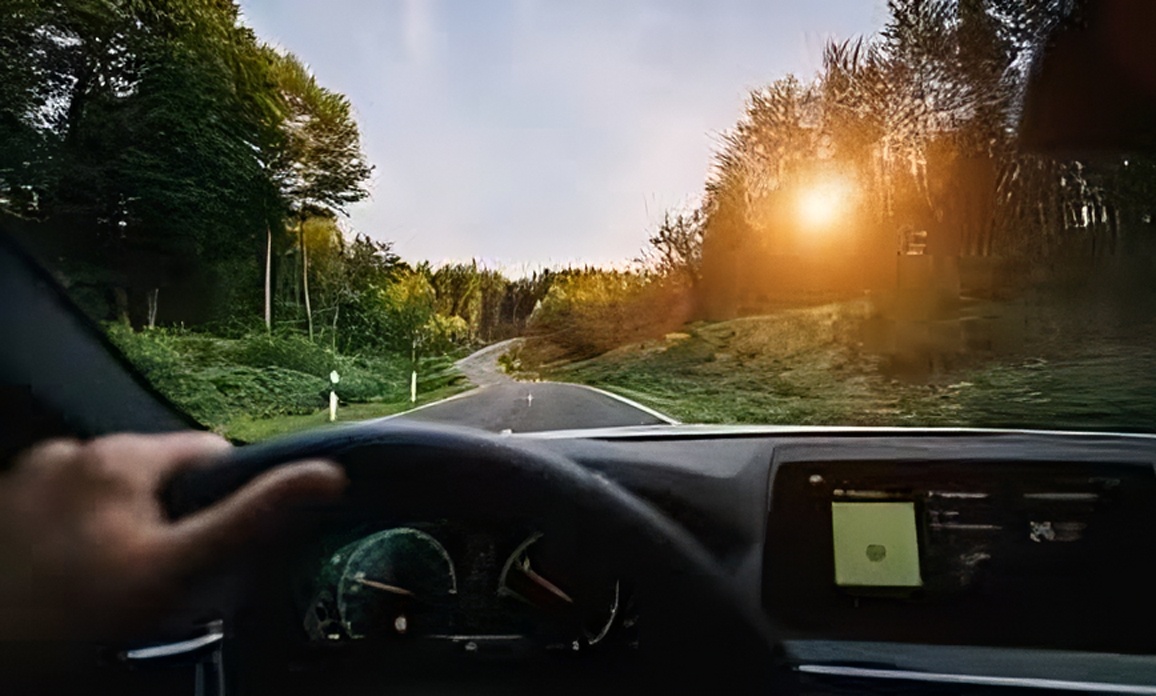 Driver's perspective view through windshield while driving
